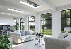 Bright interior of modern orangery with Heritage aluminium windows, on a listed building in a conservation area.